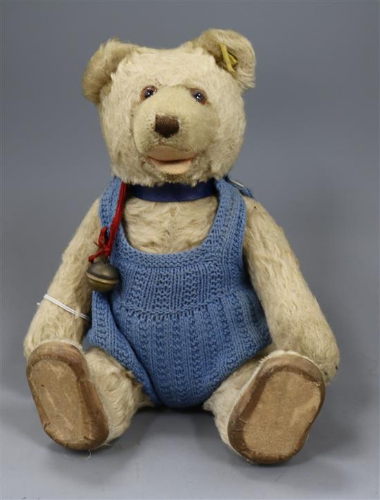 A small 1920s Steiff blonde mohair teddy bear with squeeze box, 28.5cm